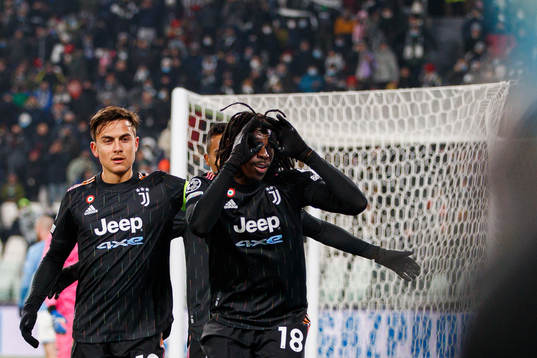 Paulo Dybala and Moise Kean of Juventus celebrate the 1-0 goal