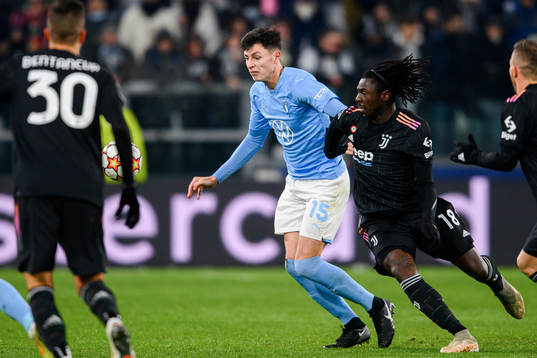 Anel Ahmedhodzic of Malmö FF and Moise Kean of Juventus