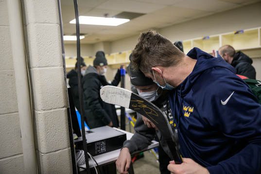Theodor Niederbach gets a hug from doctor Ryan Allenby of