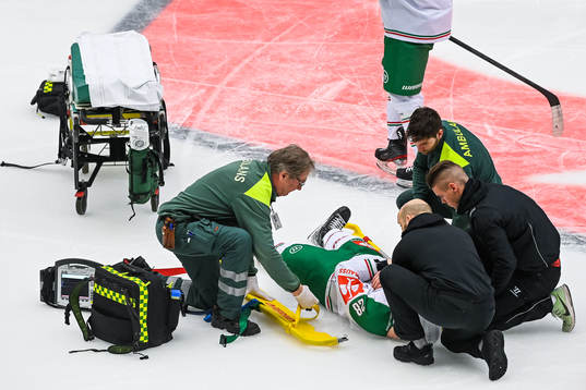 Anton Bengtsson of Rögle receives medical attention