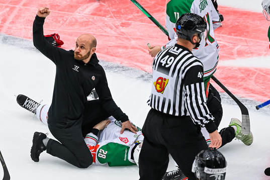 Anton Bengtsson of Rögle receives medical attention