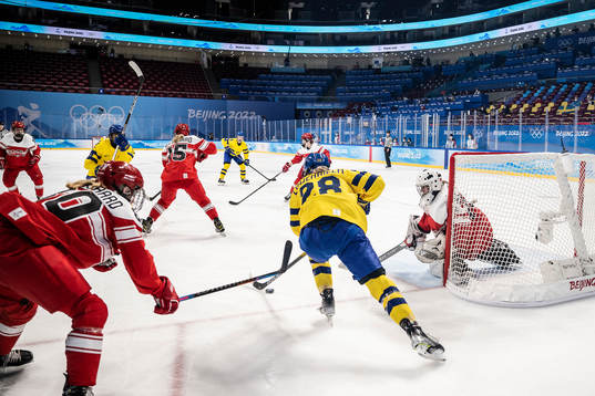 Michelle Löwenhielm of Sweden and goaltender Cassandra