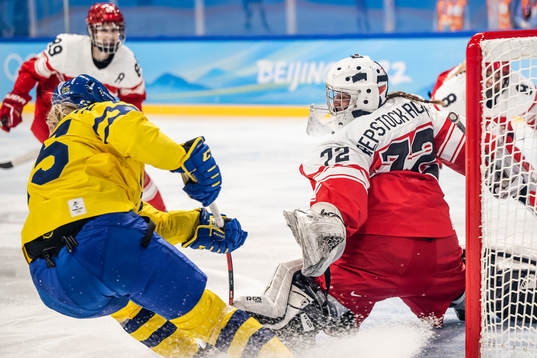 Lina Ljungblom of Sweden and goaltender Cassandra