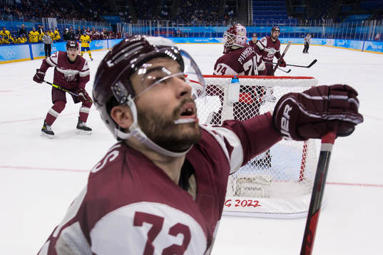 Kristaps Zile, Janis Jaks and goaltender Ivars Punnenovs of