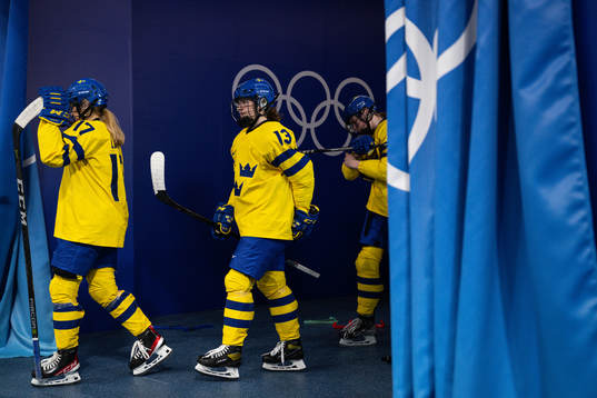 Sofie Lundin and Emma Murén of Sweden in an ice hockey