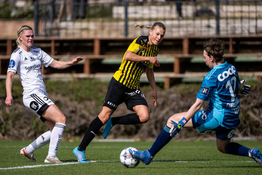 Kristine Bjørdal Leine and goalkeeper Lene Christensen of