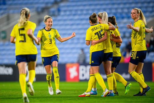 Emma Kullberg celebrates with Amanda Ilestedt of Sweden after 2-0