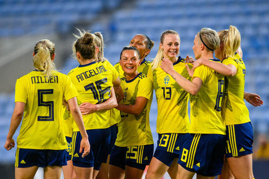 Players of Sweden celebrate 1-0