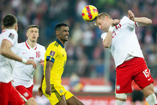 Alexander Isak of Sweden against Kamil Glik of Poland