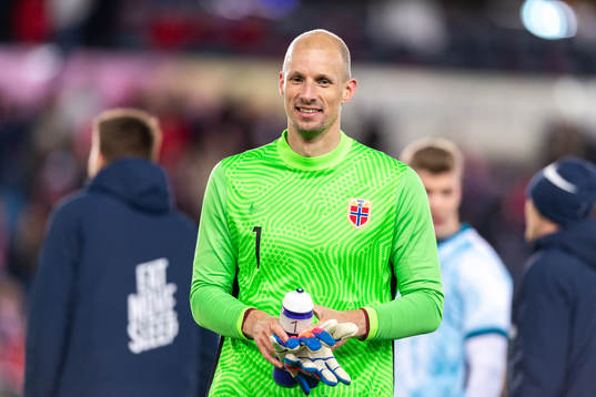 Goalkeeper André Hansen of Norway celebrates