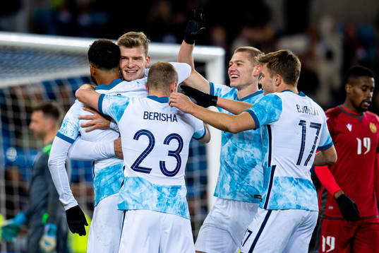 Alexander Sørloth of Norway celebrates with teammates Joshua King, Veton Berisha, Julian Ryerson and Fredrik André Bjørkan after scoring 9-0