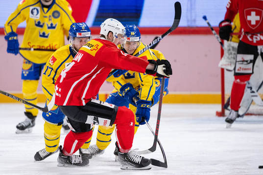 Oskar Lang and Nils Åman of Sweden against Dean Kukan of
