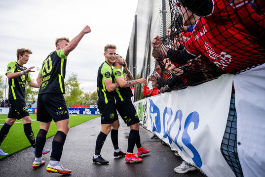 Niklas Castro of Brann celebrates with teammates Niklas