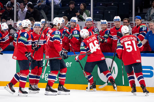 Mathis Olimb of Norway celebrate with teammates