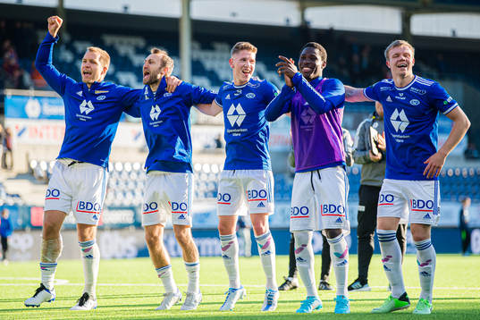 Martin Bjørnbak, Magnus Wolff Eikrem, Markus André Kaasa, Datro David Fofana and Emil Varhaugvik Breivik of Molde celebrates