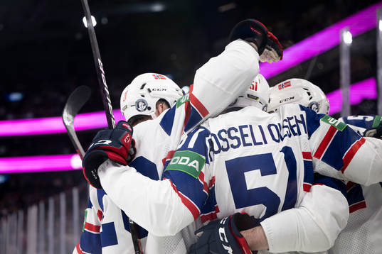 Mats Rosseli Olsen of Norway celebrate with temmates