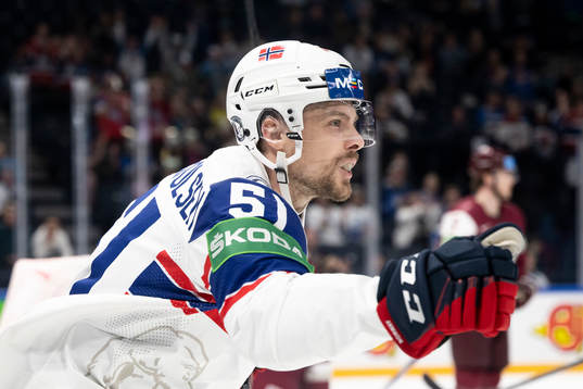 Mats Rosseli Olsen of Norway celebrates