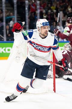 Mats Rosseli Olsen of Norway celebrates