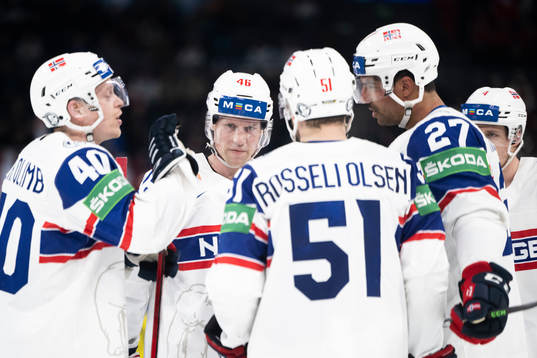 Mathis Olimb of Norway with teammates