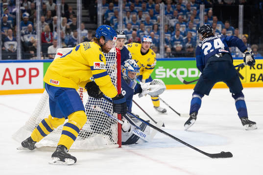 Adam Larsson of Sweden scores the 0-1 goal behind