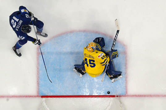 Mikko Lehtonen of Finland , not pictured, scores the 1-1