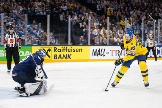 Goaltender Harri Säteri of Finland and Oliver Ekman