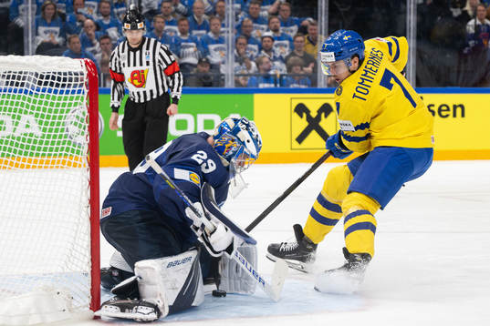Goaltender Harri Säteri of Finland and Henrik Tömmernes