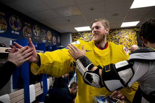 Goaltender Magnus Hellberg of Sweden celebrate with