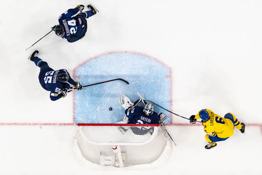 Adam Larsson of Sweden scores the 0-1 goal behind