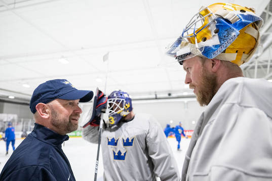 Goaltender coach Stefan Ladhe, goaltender Marcus Högberg