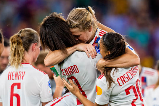Wendie Renard, Ada Hegerberg and Delphine Cascarino of Lyon celebrate winning the UEFA Women's Champions League final match between Barcelona and Lyon