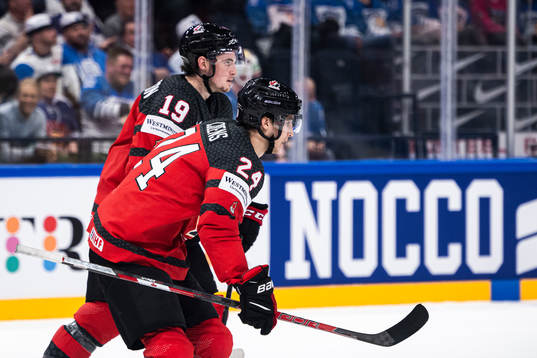 Dylan Cozens of Canada celebrates