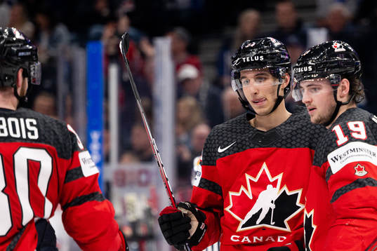 Dylan Cozens of Canada celebrates the 6-1 goal