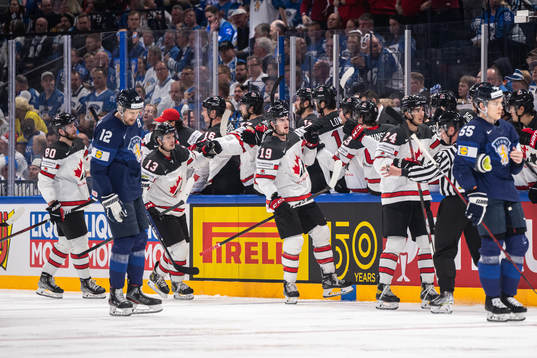Drake Batherson and Dylan Cozens of Canada celebrates