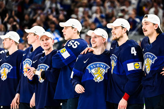 Mikko Lehtonen and Sakari Manninen of Finland celebrates