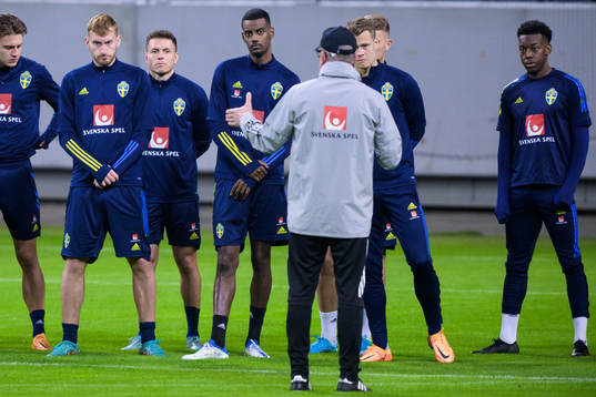 Dejan Kulusevski, Kerim Mrabti, Alexander Isak, Viktor Claesson and Anthony Elanga listen to head coach Janne Andersson of the Swedish national football team