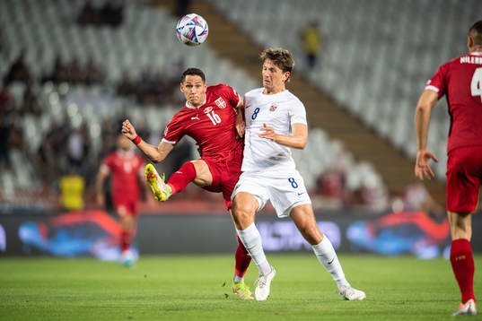 Sasa Lukić of Serbia and Sander Berge of Norway