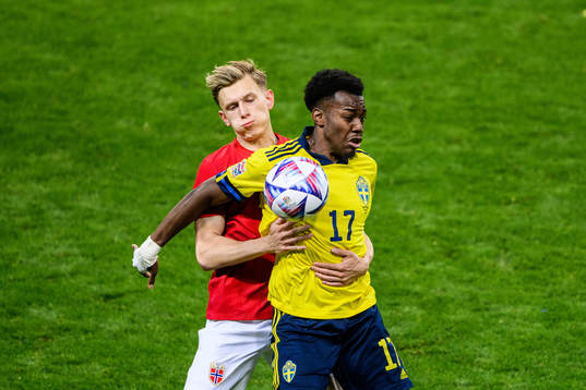 Marcus Holmgren Pedersen of Norway and Anthony Elanga of Sweden
