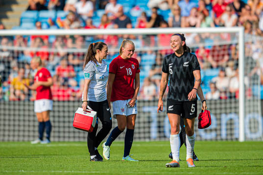 Frida Leonhardsen Maanum of Norway leaves the pitch with an injury