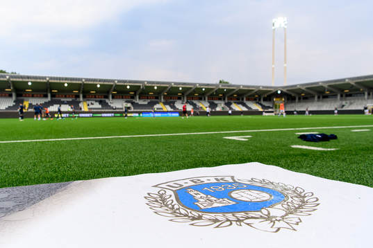 Ursiktens klubbmärke på en banderoll