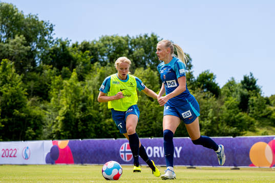 Julie Blakstad and Karina Sævik of the Norwegian national football team