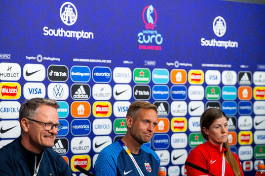 Press officer Halvor Lea, head coach Martin Sjögren and Maren Mjelde of the Norwegian national football team at a press conference