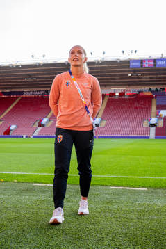 Thea Bjelde of the Norwegian national football team inspects the pitch