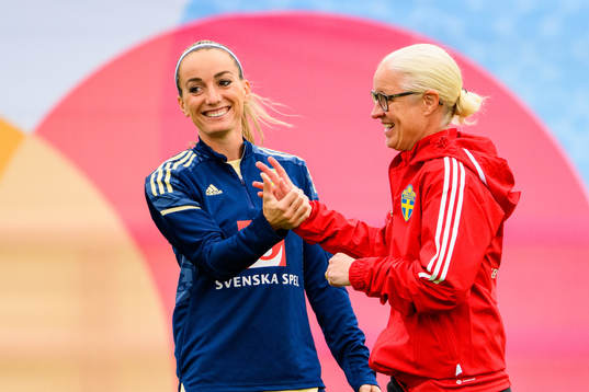 Kosovare Asllani and Victoria Sandell, assistant coach ahead of a training session with the the women's Swedish national football team