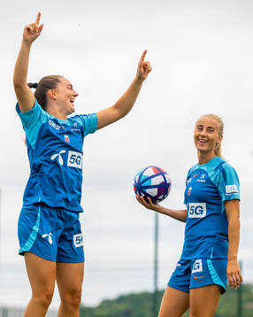 Vilde Bøe Risa and Anja Sønstevold of the Norwegian national football team celebrate at a training session