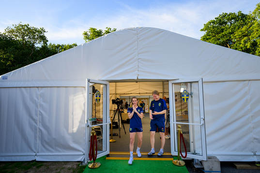 Kosovare Asllani and Fredrik Madestam, press officer of the Swedish women's national football team at a press event