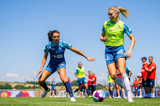 Ingrid Syrstad Engen and Ada Hegerberg of the Norwegian national football team at a training session