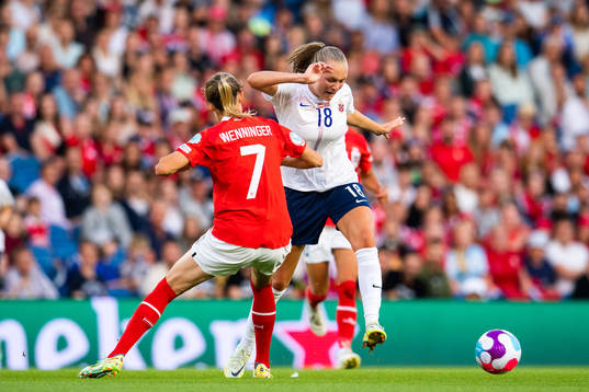 Carina Wenninger of Austria and Frida Maanum of Norway
