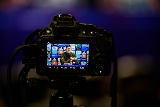 Francisco Neto, head coach of the Portuguese women's national football team is shown on a camera at a press conference