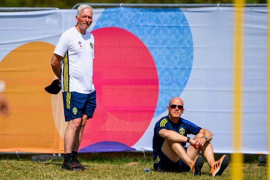 Håkan Sjöstrand, general secretary and Jens T. Andersson, head of national teams at the Swedish Football Association at a training session